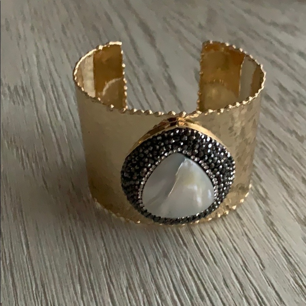 Gold and gem bangle
